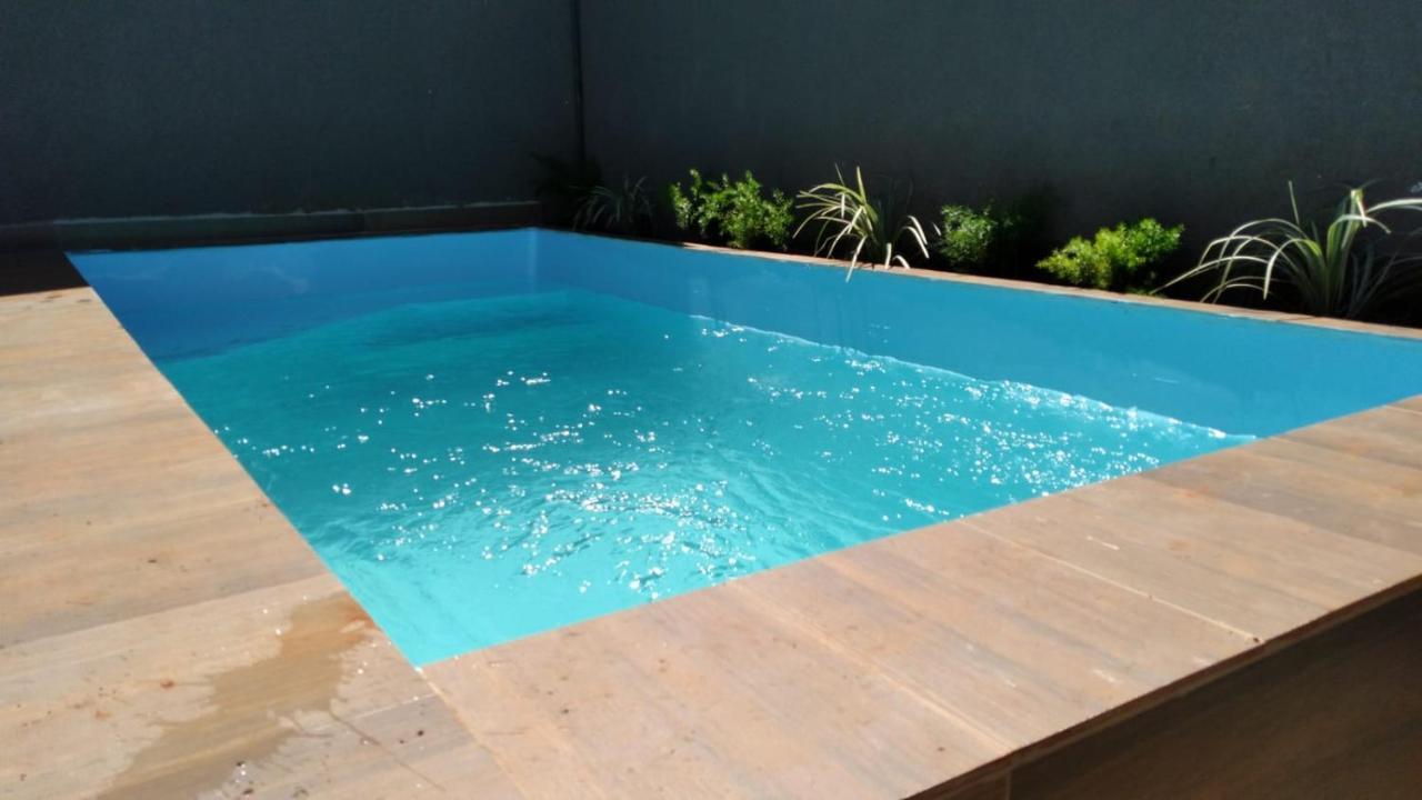 Сasa de vacaciones Casa Aconchegante Com Piscina E Bem Localizada